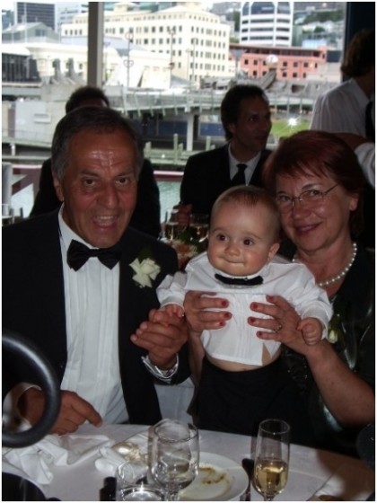 My beloved Mum and Dad holding their first born grandchild Orlando on our wedding day. A very precious image